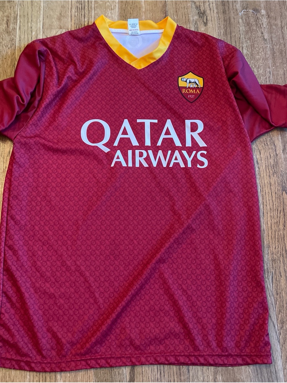 Roma tag label with maroon and gold print